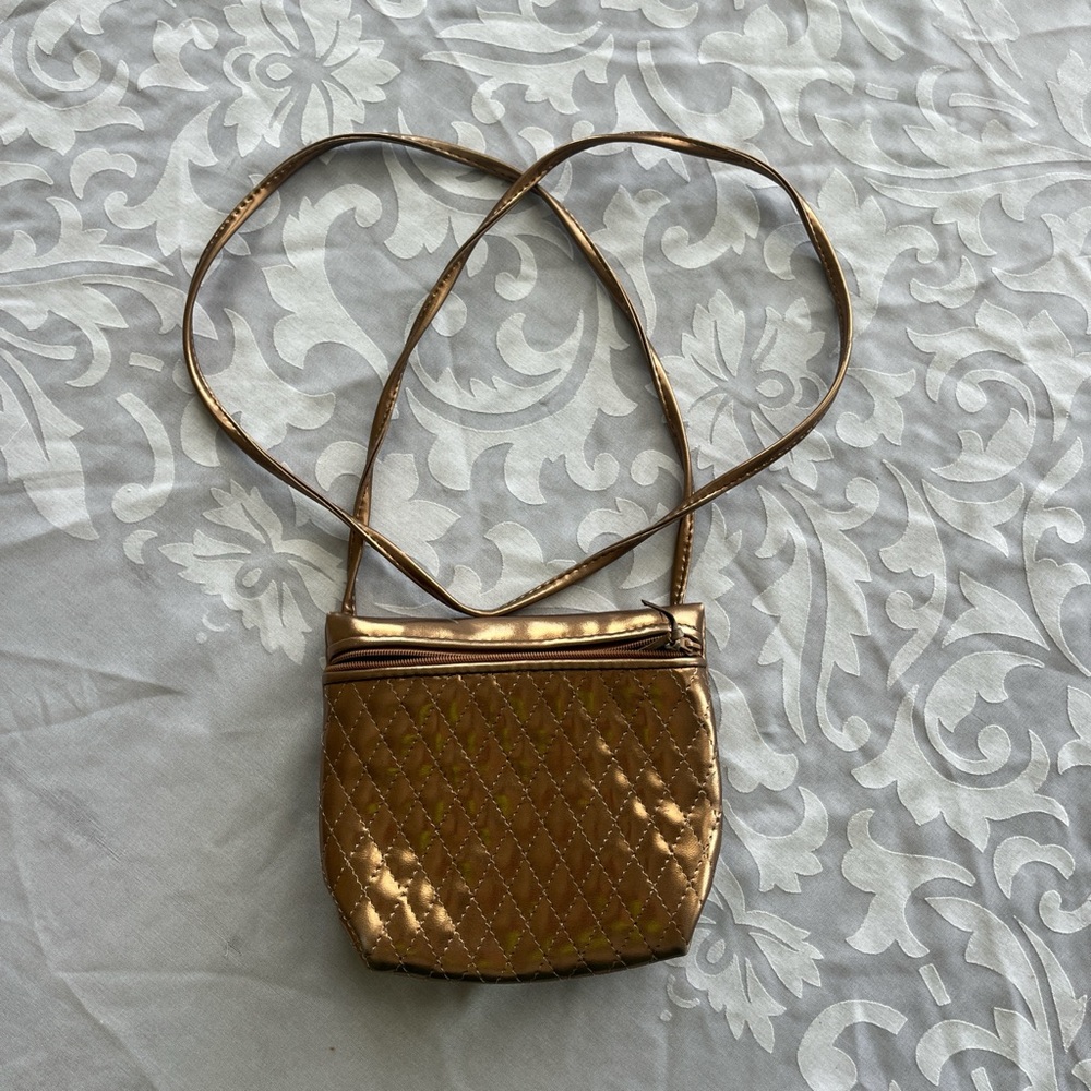 Magnum Shiny Gold Crossbody Bag